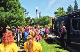 DSU alumnus Miles Beacom, '81, President/CEO of PREMIER Bankcard, addresses  a crowd at the construction celebration for the