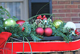 Take a cue from the christmas decorations ree drummond and the gang at the merc set up this year and dress up your own windows in holiday cheer. Cheery Christmas Flower Boxes For Outdoor Christmas Decorating