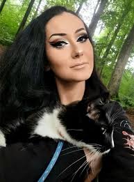 In the woods with my boy 🖤🤍 catmom