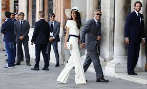 Amal alamuddin and george clooney arrived for their italian wedding in style aboard a water taxiboat with family and friends. Amal Alamuddin S Best Wedding Looks Vogue