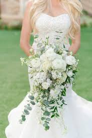 Her favorite flowers, colors and style all get included in this stunning wedding accessory. Classic White And Green Destination Wedding For Denver Couple Elizabeth Anne Designs The Wedding Blog