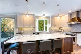 Nevertheless, it will be dressed using a. Luxury Home Interior Boasts Beautiful Black And White Kitchen Stock Photo Picture And Royalty Free Image Image 93806171