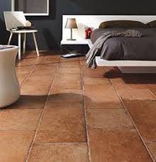 The bed is a dark wood canopy bed (same colour as the skirting boards) with mostly white bedding. 52 Colours That Look Good With Terracotta Tiles Ideas Terracotta Tiles Terracotta Floor Kitchen Flooring