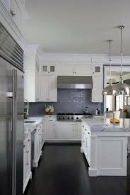 White Kitchen Cabinets With Glazed Blue Backsplash Tiles Transitional Kitchen Kitchen Design Small Kitchen Design Kitchen Cabinets