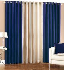Not only do they filter the sunlight, they also add warmth and make the rich cream fabric contrasts with the black furniture in this chicago apartment. Handtex Home 275 Cm 9 Ft Polyester Long Door Curtain Pack Of 3 Solid 2 Navy Blue Cream Buy Online In Papua New Guinea At Papua Desertcart Com Productid 143815499