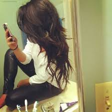 Black haired young woman with asian appearance is demonstrating dense, well cared, straight hair and vivid evening makeup on the face.asian beauty. Long Dark Hair This Is My Natural Color Time To Go Back To My Natural Look Hair And Body Hair Styles Long Hair Styles Long Dark Hair