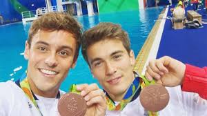 Watch: Tom Daley & Dan Goodfellow Celebrate Bronze Medal with Lots of Wet  Hugs
