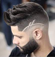 High bun and side bangs. 10 Low Fade Haircuts For Stylish Guys Haircut Inspiration In 2021 Fade Haircut Low Fade Haircut Men Hair Color