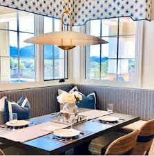 When there's limited space to move a chair in and out, a stationary seat is the better option. Banquette Dining Design Perennials Fabrics