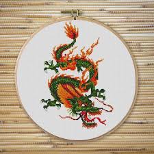 The clipart is related to chinese new year 2015 , cross bones , religious easter cross. Bearded Dragon Cross Stitch Pattern Bogo Free Fiery Dragon Etsy Dragon Cross Stitch Cross Stitch Cross Stitch Patterns