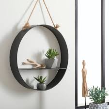 De solides plateaux en aggloméré au look vintage sont associés au cadre en métal. Etagere Murale Moderne Ronde En Metal Et Corde Style Industriel D54x10cm Etageres Murales Pier Import