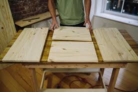 Taking your kitchen rubbish bin off the floor and into a cupboard is not only a clever solution but makes good hygienic sense for your family. How To Make A Hidden Trash Can Cabinet Danmade Watch Dan Faires Make Reclaimed Wood Furniture Hgtv