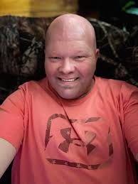 A couple of unlikely Friends, are greeting customers at Milam, TX post  office.