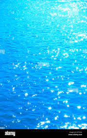 Sparkling blue ocean water Stock Photo - Alamy