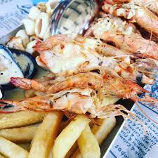 A Seafood Lovers Paradise Ocean Basket Restaurant In Cyprus Seafood Seafood Platter Food Lover