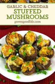 Garlic And Cheddar Stuffed Mushrooms Recipe Appetizer Recipes Real Food Recipes Stuffed Mushrooms