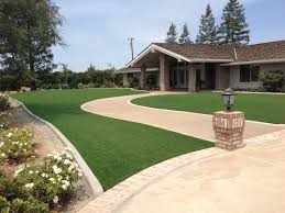 Brick, stone, or pavers can unify the edging with a patio or path. 7 Landscape Edging Ideas For Artificial Grass Lawns Install It Direct