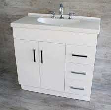 Open shelving on one half creates opportunities for design flexibility, while paneled drawers on the opposite side conceal cleaning supplies. Harmony 900mm Gloss White Vanity On Kick