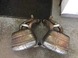 Known as the gundo hack, it consists of a welding a small bypass pipe between the inlet and outlet pipes of the standard mufflers. Not Happy With Gundo Hack Mufflers Sound Muffler Pics 6speedonline Porsche Forum And Luxury Car Resource