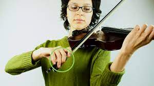 Place the violin on your left collar bone (some violinists prefer the soft spot just behind the collar bone), and rest the left side of your jaw on the chin rest. 3 Ways To Hold A Violin Wikihow