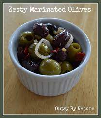 Zesty Marinated Olives Gutsy By Nature Recipe Olive Recipes Food Marinated Olives