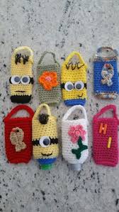 I use it for note paper, pen and hand sanitizer and a emergency window break/seat belt tool Crochet Hand Sanitizer Covers Crochet Accessories Crochet Bag Minion Crochet