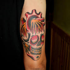 For example, the sugar skull tattoo exemplifies the soul or afterlife as a celebration of and tribute to lost loved ones. Traditional Skull Heart Tattoo Novocom Top