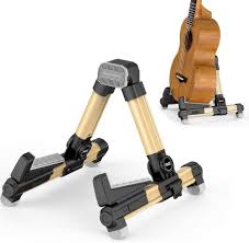 Maybe you would like to learn more about one of these? Amazon Com Portable Folding Ukulele Stand By Hola Music Gold Aluminum Musical Instruments