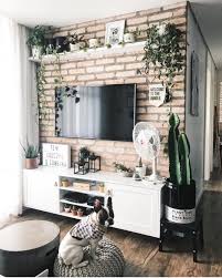 If you're using shelves for your gallery wall, try creating a pyramid display, with a row of photos on the bottom shelf and just a couple large photos on the top shelf. 10 Ideas On How To Decorate A Tv Wall Decoholic