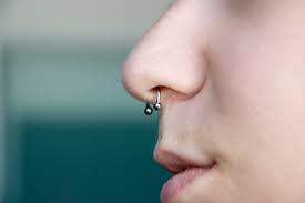Accidentally bumping or jostling the piercing. How To Know If Your Septum Piercing Is Infected Or Still Healing Photos