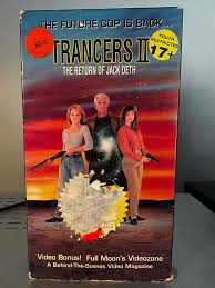 Get ready for the ULTIMATE “Trancers” experience with this newly re-edited  “master cut” of director David (GAME OF THRONES) Nutter's TRANCERS 4 and  TRANCERS 5, remixed into one mega movie! When the