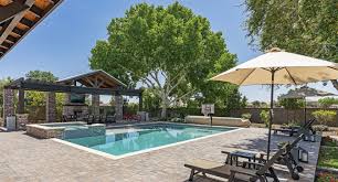 Magnolias are good as strictly ornamental plants, though they do produce berries that the birds enjoy in fall. Swimming Pool Construction And Trees Woodfield Outdoors
