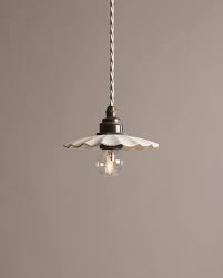 Ceiling light porcelain fixture with brass. Lighting Devol Kitchens
