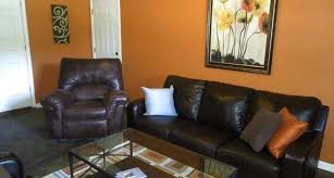 Orange living room color scheme with modern furniture design. 17 Genius Burnt Orange House Paint Homes Decor