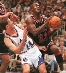 The chicago bulls' michael jordan (23) goes up and under utah jazz forward karl malone, left, as he drives to the hoop during the third quarter of game 2 in the nba finals wednesday, june 4, 1997. Gallery 1997 Nba Finals Between Utah Jazz And Chicago Bulls