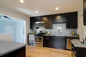 Espresso Cabinets And Light Hardwood Floors Espresso Cabinets Espresso Kitchen Cabinets Espresso Kitchen