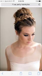 A Cute Bun With A Braid Around Perfect For A Summer Party Hair Styles Medium Hair Styles Hairstyle