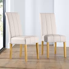 The most common dining chairs material is cotton. Carrick Ivory Leather Dining Chair Oak Leg Furniture And Choice