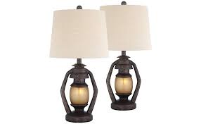 Simple lighting bulbs are okay with the theme, but nothing decorates your nightstand or desk table better. Horace Rustic Farmhouse Table Lamps Set Of 2 With Nightlight Miner Lantern Brown Oatmeal Tapered Drum Shade For Living Room Bedroom House Bedside Nightstand Home Office Family Franklin Iron Works Amazon Com