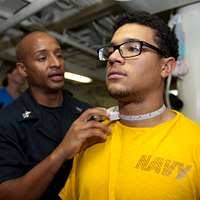 Petty Officer 2nd Class John Minton, a boatswain's