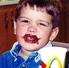 My sweet boy hugging our sweet Olive girl.