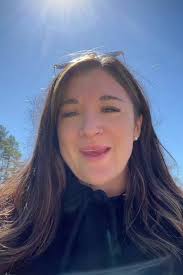 Melissa Masterson Gribbins Putging Down Black Mulch