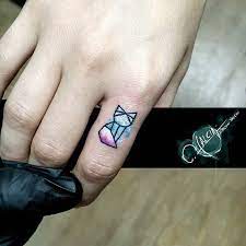23 Cool Finger Tattoo Ideas 14 Cute Origami Cat Tattoo Fingertattoo Tattoos Wrist Tattoos For Guys Small Wrist Tattoos Finger Tattoo Ideas