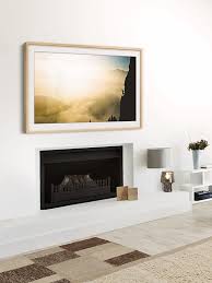 Samsung S The Frame Digital Picture Frame Over A Fireplace This Gorgeous Piece Is Actually A Tv Framed Tv Living Room Tv Picture Frame Tv
