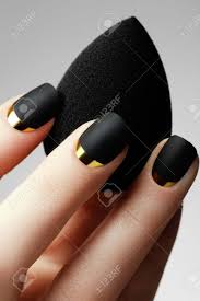 It is extremely easy to apply because of the large applicator brush, and it becomes opaque in. Black Matte Nail Polish Manicured Nail With Black Matte Nail Stock Photo Picture And Royalty Free Image Image 68579629