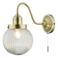 Maybe you would like to learn more about one of these? Tamara Single Wall Light Antique Brass Ribbed Glass