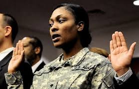 Nearly 100 people are sworn in as U.S. citizens during ceremonies at  federal and county courthouses
