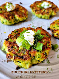 Make sure you squeeze out all the excess water from your grated zucchini before you make your batter. Cheesy Zucchini Fritters With Garlic And Dill Daily Yum