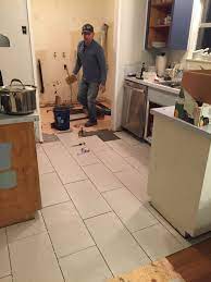 After Ripping Up The Old Flooring We Discovered Water Damage And Ended Up Needing To Rip Out The Old Sub F Budget Kitchen Makeover Kitchen On A Budget Flooring