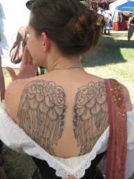 37 black angel wings tattoo. Charming Angel Tattoo Designs